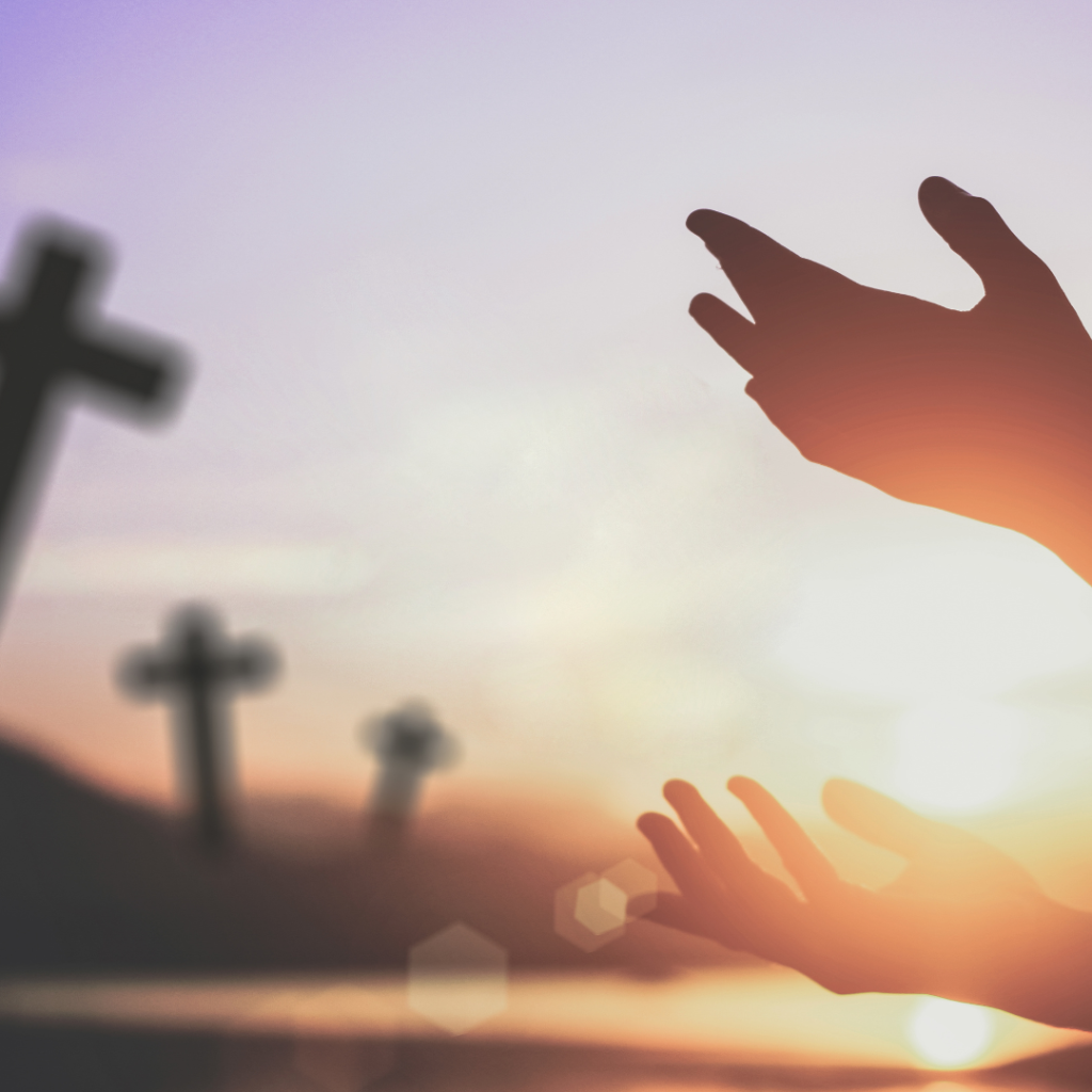 As a superstitious christians we learn to put our trust in God for our present and future, letting Him guide our lives instead of relying on superstitions. Image is of hands raised towards heaven with crosses in the background.